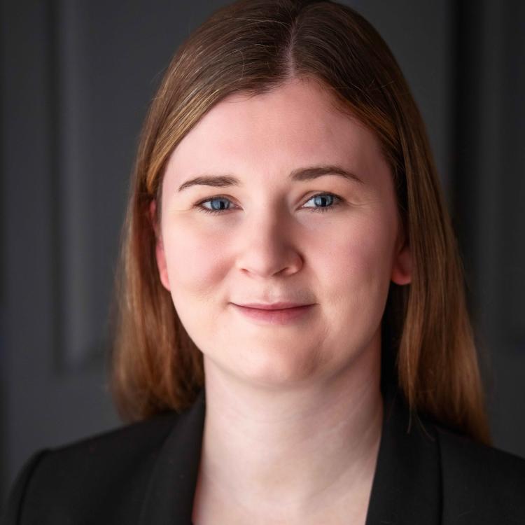 Dr.  Amadene Woolsey